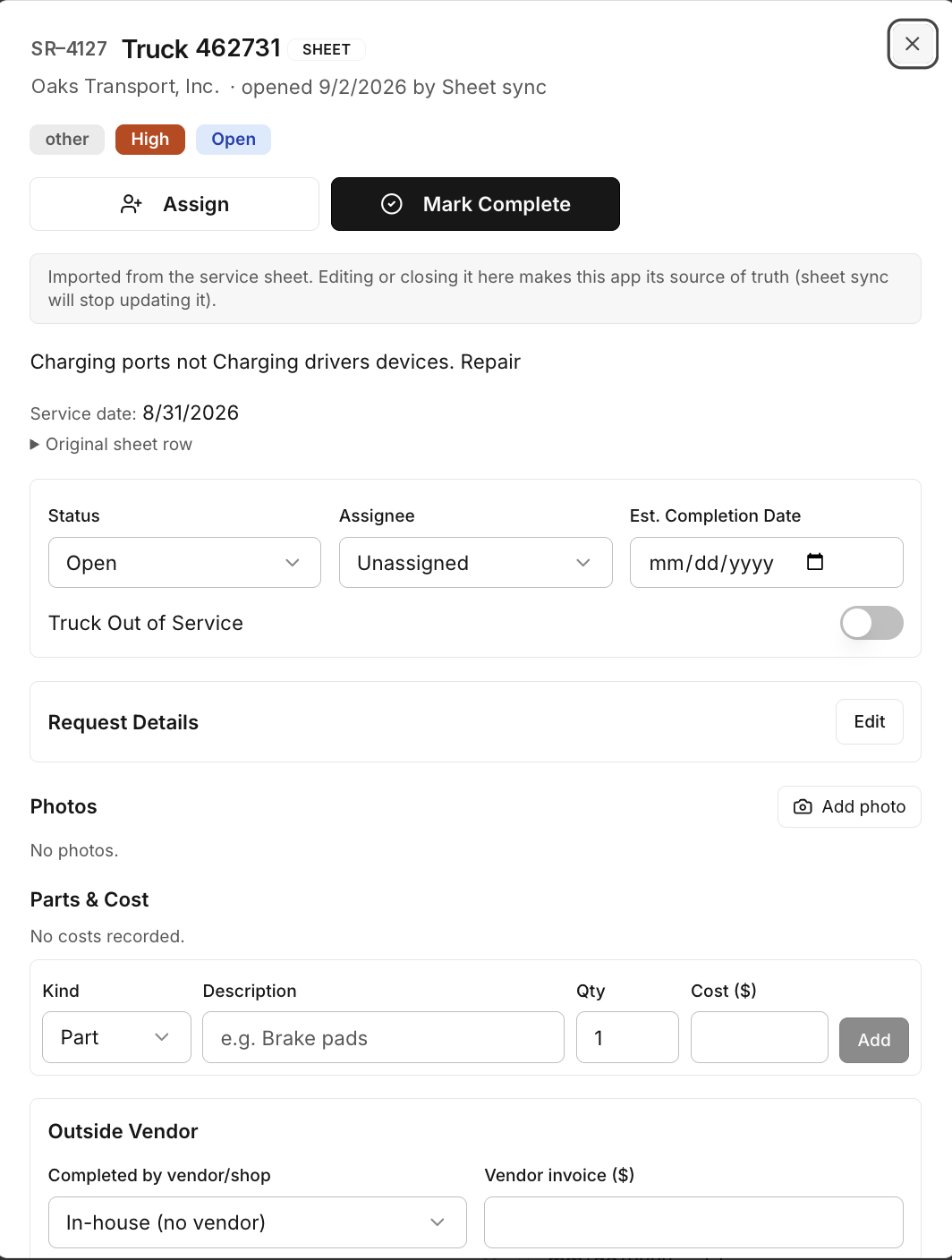 Logik fleet service request detail showing vehicle assignment, status, completion date, repair photos, parts, and cost controls.